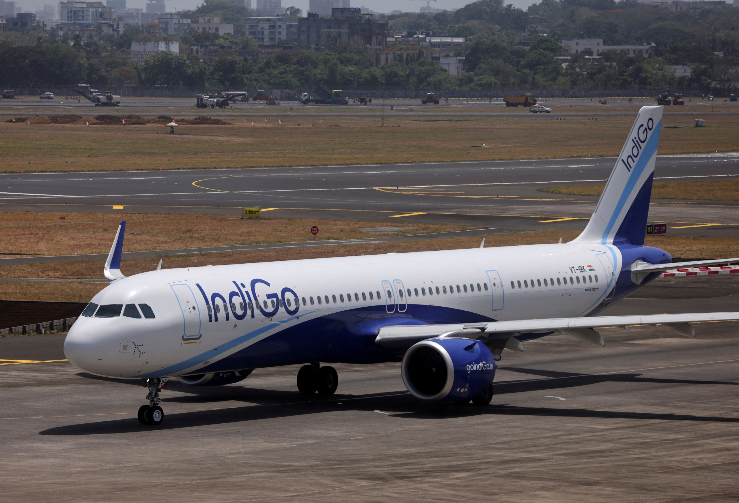 FILE PHOTO: An IndiGo airlines passenger aircraft taxis on the tarmac at Chhatrapati Shivaji International airport in Mumbai